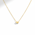Aura Dainty Gold Necklace minimalist pendant on white background